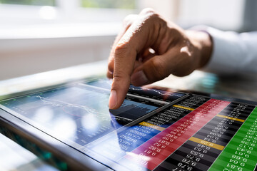Poster - African Man Using Stock Market Data