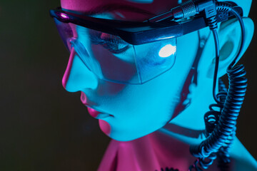 Poster - Close-up of the robot face. Artificial intelligence. A female cyborg. Controlled robots. Development of artificial intelligence.