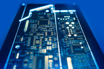 Aufkleber - PCB board in blue background. High-tech electronic printed circuit board. Computer board is partially blurred. PCB board with processor and microchips. Microboard close-up. Dark color microboard.