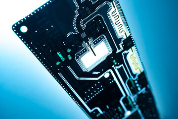 Poster - Silhouette of PCB board on a blue background. Blank for creating a printed circuit board. Concept - PCB board production. Computer background. Silhouette of a microboard close up.