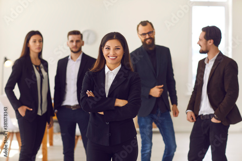 Fotografía Happy young female team leader or executive manager smiling and looking at camer