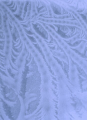  Frosted window glass texture. Winter ice frost, frozen background. Icy glass. Frost creates fascination patterns on a window in winter.