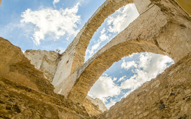 Fototapete - Ruins of an old castle in south of Italy