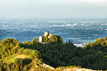 Scenic view of Bianello castle on top of the rock during the sunset. Extensive view of Po Valley in the background. Quattro castella, Reggio Emilia, Emilia Romagna, Italy