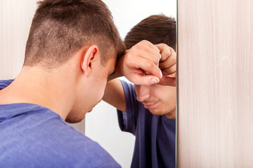 Wall Mural - Sad Young Man