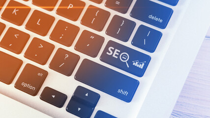 Poster - Closeup Of Word Seo On Computer Keyboard Over White Background