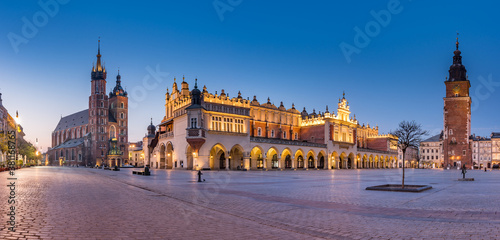 Krakow, Poland, main square night panorama with Cloth Hall and St Mary's church © tomeyk