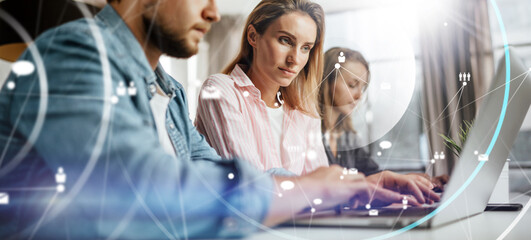 Wall Mural - group of young business people working together on a project. networking. startup concept