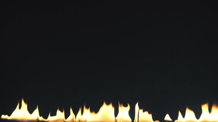 Wall Mural - Fire line in slow motion on black