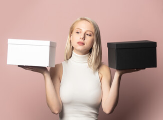 Sticker - Portrait of blonde in top with black and white gift boxes