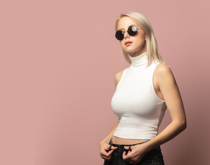 Wall Mural - Style blonde in top and sunglasses