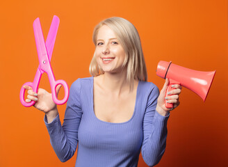 Sticker - Cute blonde in blue blouse with big scissors and megaphone