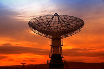 Wall Mural - the silhouette of a radio telescope observatory