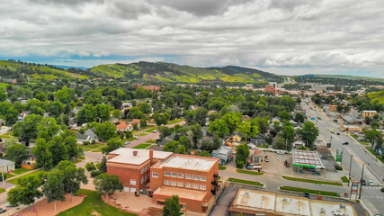 Sticker - RAPID CITY, SD -JULY 2019: Arial view of Rapid City on a cloudy summer day, South Dakota