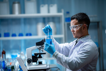 Wall Mural - the researchers are working in a chemical laboratory.
