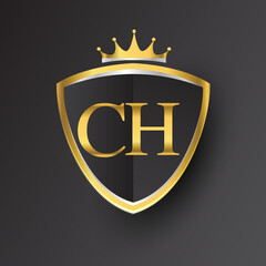 Initial logo letter CH with shield and crown Icon golden color isolated on black background, logotype design for company identity.