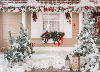christmas decorated house and yard. studio decoration in new year style. snow covered courtyard of a