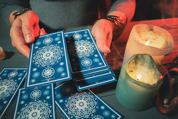 Wall Mural - Fortune teller is reading a future by tarot cards.