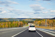 © Viktoriya - Beautiful asphalt roadway to lake Baikal on a Sunny autumn day, Russia.