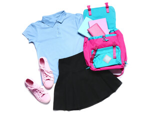 Stylish school uniform with backpack on white background