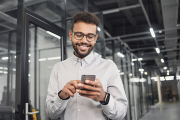 man professional using smartphone in office. businessman working, texting mobile phone. communicatio