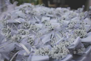 Closeup shot of beautiful white wedding favors