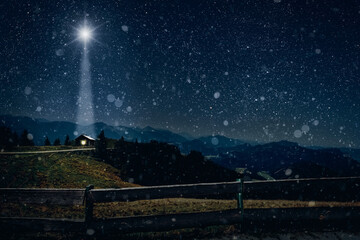 Wall Mural - The star shines over the manger of christmas of Jesus Christ.