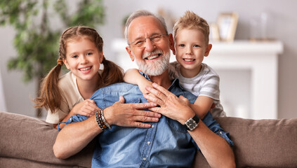 Sticker - Happy senior woman hug grandkids.