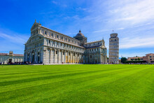 Pisa Cathedral (Duomo Di Pisa) With Leaning Tower Of Pisa On Piazza Dei Miracoli In Pisa, Tuscany, Italy. World Famous Tourist Attraction And Travel Destination.