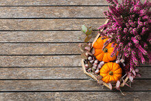 Autumn Fall Thanksgiving Day Floral Composition With Pumpkins And Heather