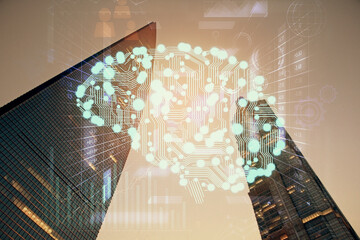 Brain hologram drawing on city scape background Double exposure. Brainstorming concept.