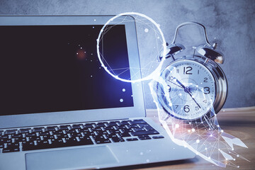 Desktop computer background in office and start up theme hologram drawing. Double exposure. Startup concept.