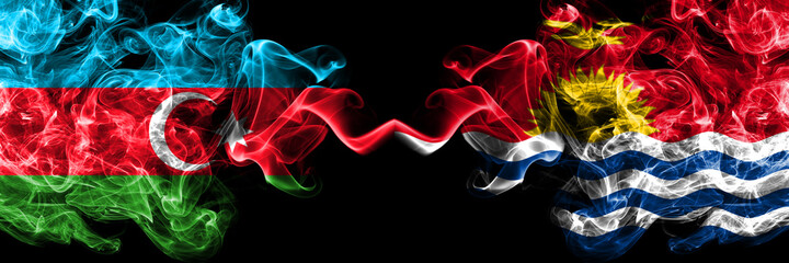 Azerbaijan, Azerbaijani vs Kiribati smoky mystic flags placed side by side. Thick colored silky abstract smoke flags