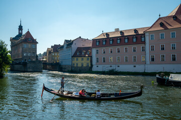 Poster - the Regnitz river in Bamberg with a gondola on a ruise