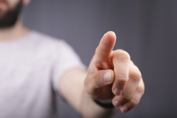 Poster - touching finger press young man