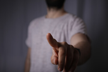 Poster - touching finger press young man