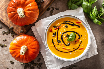 Wall Mural - Homemade pumpkin soup in bowles with. Autumn hokkaido soup with balsamic vinegar