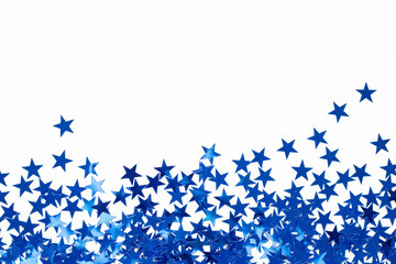 Christmas border with blue star confetti. Holiday background for New Year on white