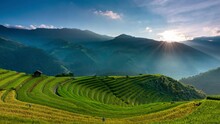 4K Timelapse Of Sunset Over Terraced Rice Fields With Lens Flare, Mu Cang Chai, Yen Bai, Vietnam
