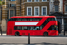 Red London Buses Operating During Lockdown Pandemic In Central London, UK Due To Covid19 Coronavirus.