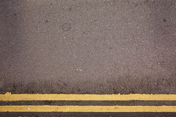 yellow lines on the asphalt