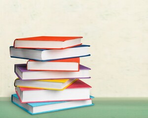 Wall Mural - Stack of colorful books collection on the desk