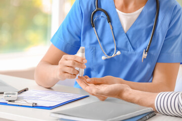 Poster - Diabetic man visiting doctor in clinic