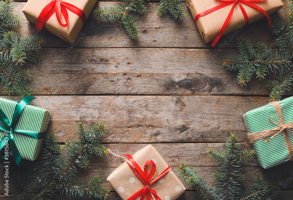 Beautiful Christmas gifts on wooden background