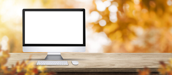 Aufkleber - Autumn background.Blank desktop computer on rustic wood table with blur forest tree with sunlight,Autumn fall backdrop, banner for product display for advertise on online,thanksgiving concept