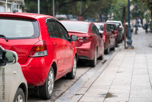 Plakat Cars parked on the urban street side