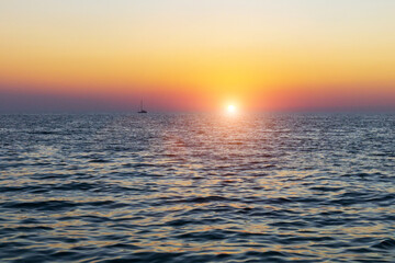 Wall Mural - Sunset sea horizon ship silhouette landscape. Marine nature sun