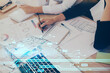 © peshkova - Double exposure of woman's writing hand on background with data technology hud. Big data concept.