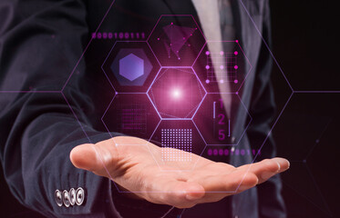 Poster - Unrecognizable Businessman Holding Hologram With Cell Framed Digital User Interface Elements