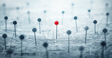 One Red Pin On The City Map Among Many Other Colorless Pins. Concept On The Topic Of Personality, Leadership, Choice, Travel, Navigation,  Geography Etc.. Shallow Depth Of Focus. Pins On Map.